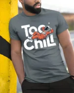 Too Chill Astronaut Relaxing Funny Space Graphic T Shirt - model wearing grey tee, leaning on column