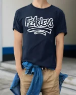 Fearless Bold Statement Graphic T Shirt Motivational Streetwear Style - model wearing navy tee with hands in pockets