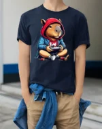 Cute Capybara Gamer Hoodie Playing Controller Graphic T Shirt - model wearing navy tee with hands in pockets