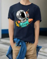Galactic Astro Rider Rocket Ship Ray Gun Graphic Tshirt - model wearing navy tee with hands in pockets