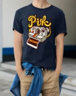 Vintage Camera Character Pik Photographe Graphic Tshirt - model wearing navy tee with hands in pockets