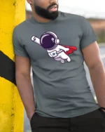 Heroic Space Voyager Superhero Red Cape Graphic Tshirt - model wearing grey tee, leaning on column