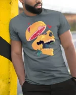 Surreal Sliced Grapefruit Skull Artistic Graphic Tshirt - model wearing grey tee, leaning on column