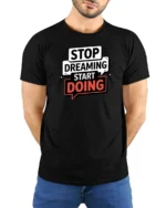 Motivational Stop Dreaming Start Doing Graphic Tshirt - model wearing black tee with hands behind back