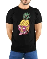 Zesty Pineapple Rockstar Pink Sunglasses Graphic Tshirt - model wearing black tee with hands behind back
