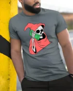 Bold Money Reaper Cash Calling Red Cloak Graphic Tee - model wearing grey tee, leaning on column