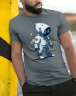 Lil Hypebeast Space Cadet Blue Eye Astronaut Graphic Tee - model wearing grey tee, leaning on column