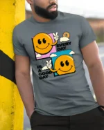 Cheerful Smiley Face Peace Sign Every Day Good Day Tshirt - model wearing grey tee, leaning on column