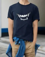 Wicked Vampire Fangs Distressed Monster Smile Graphic Tee - model wearing navy tee with hands in pockets