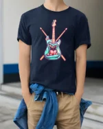 Teal Rock Monster Guitar Crossed Drumsticks Graphic Tshirt - model wearing navy tee with hands in pockets
