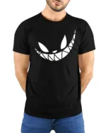 Grinning Cheshire Monster Toothy Smile Graphic Tshirt - model wearing black tee with hands behind back