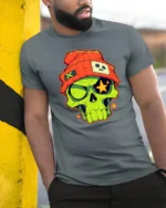 Funky Beanie Skull Glowing Star Eyes Urban Graphic Tshirt - model wearing grey tee, leaning on column