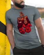 Primal Power Gorilla Boxing Gloves Retro Graphic Tshirt - model wearing grey tee, leaning on column