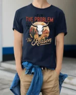 Bold Desert Bull Skull Western Slogan Graphic Tshirt - model wearing navy tee with hands in pockets