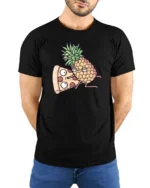 Amusing Pineapple Pizza Slice Cartoon Food Humor Tshirt - model wearing black tee with hands behind back