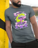 Radiant Retro Dinosaur Street Art Graffiti Graphic Tshirt - model wearing grey tee, leaning on column