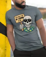 Zany Skeleton Hawaiian Shirt I Have A Lot Of Living To Do Tee - model wearing grey tee, leaning on column