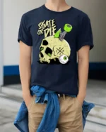 Daring Skate Or Die Skull Green Wheels Graphic Retro Tshirt - model wearing navy tee with hands in pockets