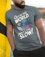 Sarcastic Alien Internet Connection Slow Graphic Tshirt - model wearing grey tee, leaning on column