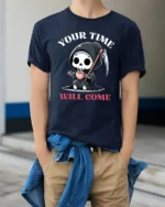 Cute Grim Reaper Your Time Will Come Coffee Graphic Tshirt - model wearing navy tee with hands in pockets