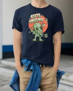 Adorable Cthulhu World Destroyer Mythical Graphic Tshirt - model wearing navy tee with hands in pockets