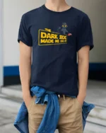 Funny Dark Side Black Cat Spilling Coffee Graphic Tshirt - model wearing navy tee with hands in pockets