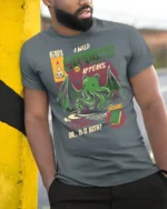 Retro Comic Book Cathulhu Monster Cat Graphic Tshirt - model wearing grey tee, leaning on column