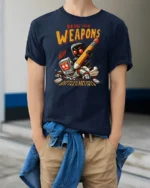 Funny Draw Your Weapons Battle Of The Artists Graphic Tee - model wearing navy tee with hands in pockets