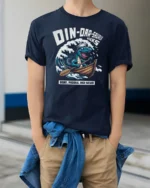 Funny Dinoarsaurus Wreks Sailor Dinosaur Graphic Tshirt - model wearing navy tee with hands in pockets