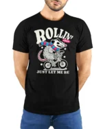 Funny Possum Riding Bicycle Rollin Free Graphic Tshirt - model wearing black tee with hands behind back