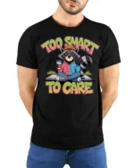 Funny Raccoon Too Smart To Care Coffee Quote Graphic Tshirt - model wearing black tee with hands behind back
