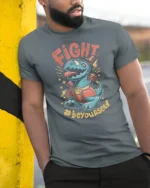 Cute Champion T Rex Boxer Hashtag Beyourself Graphic Tee - model wearing grey tee, leaning on column