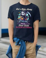 Introvert Grim Reaper Riding Motorcycle Slogan Tshirt - model wearing navy tee with hands in pockets