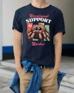Cute Emotional Support Spider Fluffy Tarantula Graphic Tee - model wearing navy tee with hands in pockets