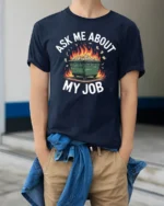 Humorous Dumpster Fire Ask Me About My Job Slogan Tshirt - model wearing navy tee with hands in pockets