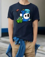 Creative Moniak Graffiti Character Roller Spray Graphic Tee - model wearing navy tee with hands in pockets