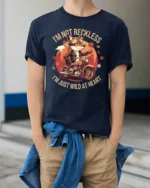 Adventurous Motorbiking Fox Wild At Heart Custom Graphic Tee - model wearing navy tee with hands in pockets