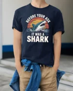 Funny Before You Ask It Was A Shark Quote Tshirt - model wearing navy tee with hands in pockets