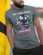 Introvert Grim Reaper Riding Motorcycle Slogan Tshirt - model wearing grey tee, leaning on column