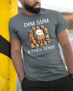 Funny Dim Sum And Then Some Cute Dumpling Graphic Tshirt - model wearing grey tee, leaning on column