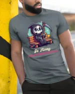 Cute Grim Reaper Go Away Im Introverting Graphic Tshirt - model wearing grey tee, leaning on column