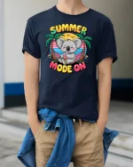 Happy Summer Mode On Koala Hammock Tropical Graphic Tee - model wearing navy tee with hands in pockets