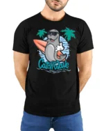 Cool Surfing Seal Catch The Wave Beach Graphic Tshirt - model wearing black tee with hands behind back