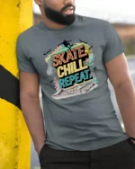 Vibrant Neon Skate Chill Repeat Pastel Gradient Tshirt - model wearing grey tee, leaning on column