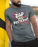 Pop Art Zap The Pattern Colorful Retro Explosion Graphic Tee - model wearing grey tee, leaning on column