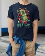 Retro 999 In 1 Brick Game Handheld Nostalgia Graphic Tshirt - model wearing navy tee with hands in pockets