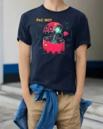 Cybernetic Pac Bot Arcade Ghost Retro Gaming Graphic Tshirt - model wearing navy tee with hands in pockets