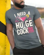 Cheeky I Need A Huge Cocktail Pink Martini Graphic Tshirt - model wearing grey tee, leaning on column