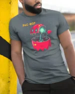 Cybernetic Pac Bot Arcade Ghost Retro Gaming Graphic Tshirt - model wearing grey tee, leaning on column