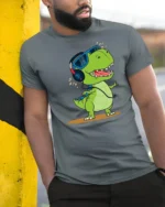 Groovy Dinosaur Dj Headphones Retro Music Lover Graphic Tshirt - model wearing grey tee, leaning on column